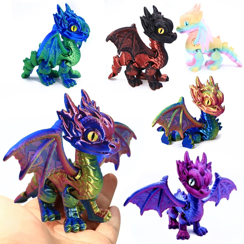 A collection of five articulated 3D printed dragon figurines in various colors and finishes.