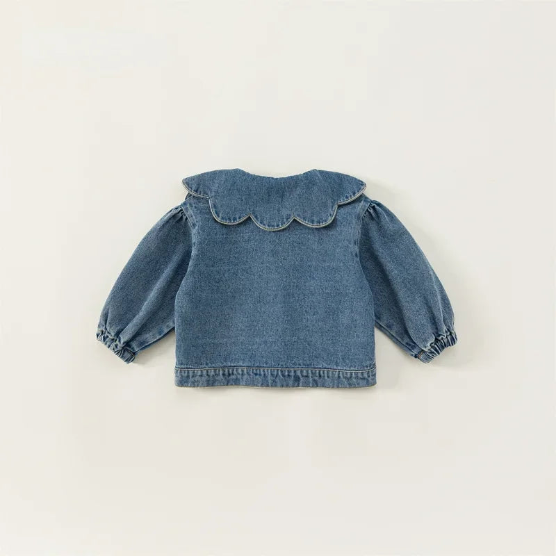 A denim jacket for kids featuring a ruffled collar and short sleeves.