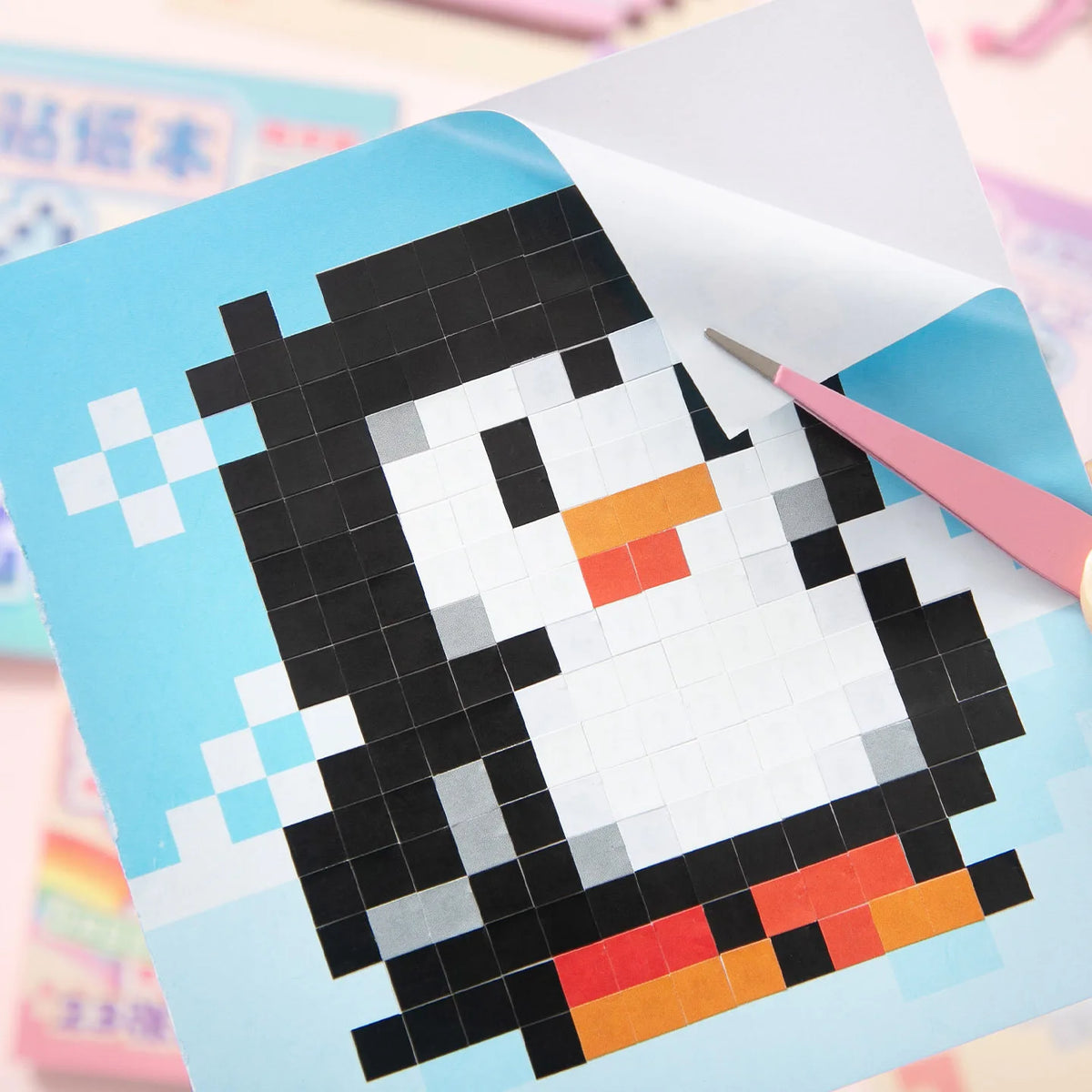 A square grid of black and white tiles forming a cartoon penguin face on a light blue background.