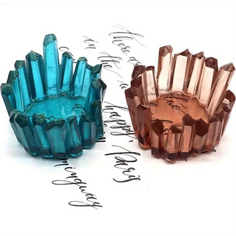 A set of teal and rose gold crystal silicone candle molds for DIY resin crafts