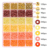 A plastic tray filled with various colors of clay and alphabet beads for DIY jewelry making