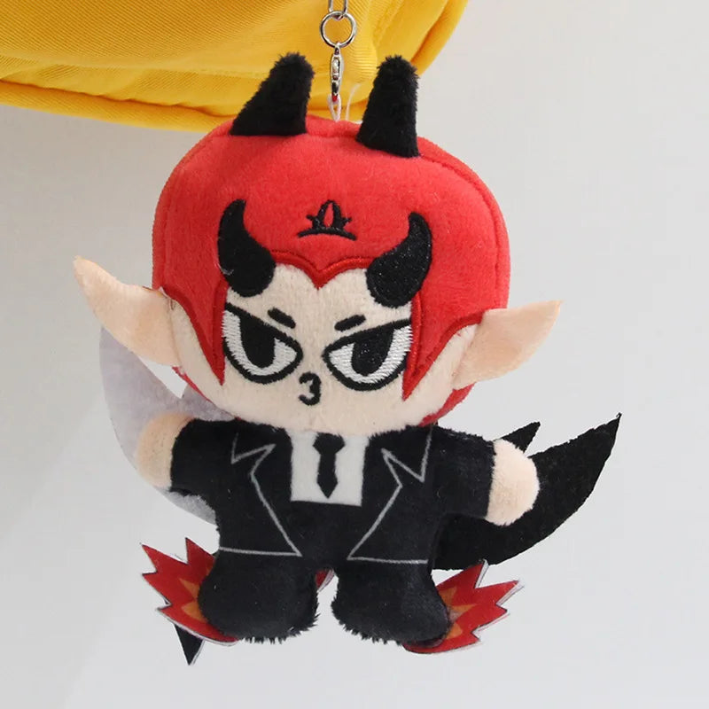 A plush pendant doll of a red-haired character with black horns and a dark outfit.