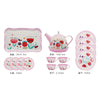 A pink metal pretend play tea set for kids including a teapot, saucers, and cups.