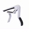 A white aluminum alloy quick-change guitar capo with a black grip and adjustable clamp.