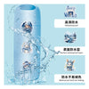 A tall, light blue cylindrical container is shown with water splashing around it, demonstrating its waterproof features.
