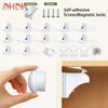 White self-adhesive screws and magnetic locks for cabinet and drawer safety.