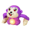 A purple interactive rolling monkey toy with large eyes and a smiling expression.