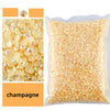 Bag of champagne gold flat back resin rhinestones for crafts and DIY projects