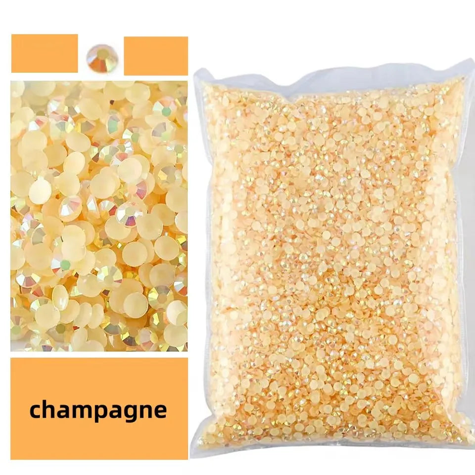 Bag of champagne gold flat back resin rhinestones for crafts and DIY projects