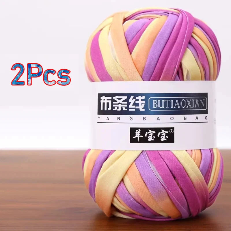 Two skeins of colorful soft chunky t-shirt yarn for crochet and knitting projects