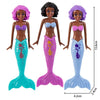 A set of four mermaid dive toys featuring different colored hair and scales for pool fun.