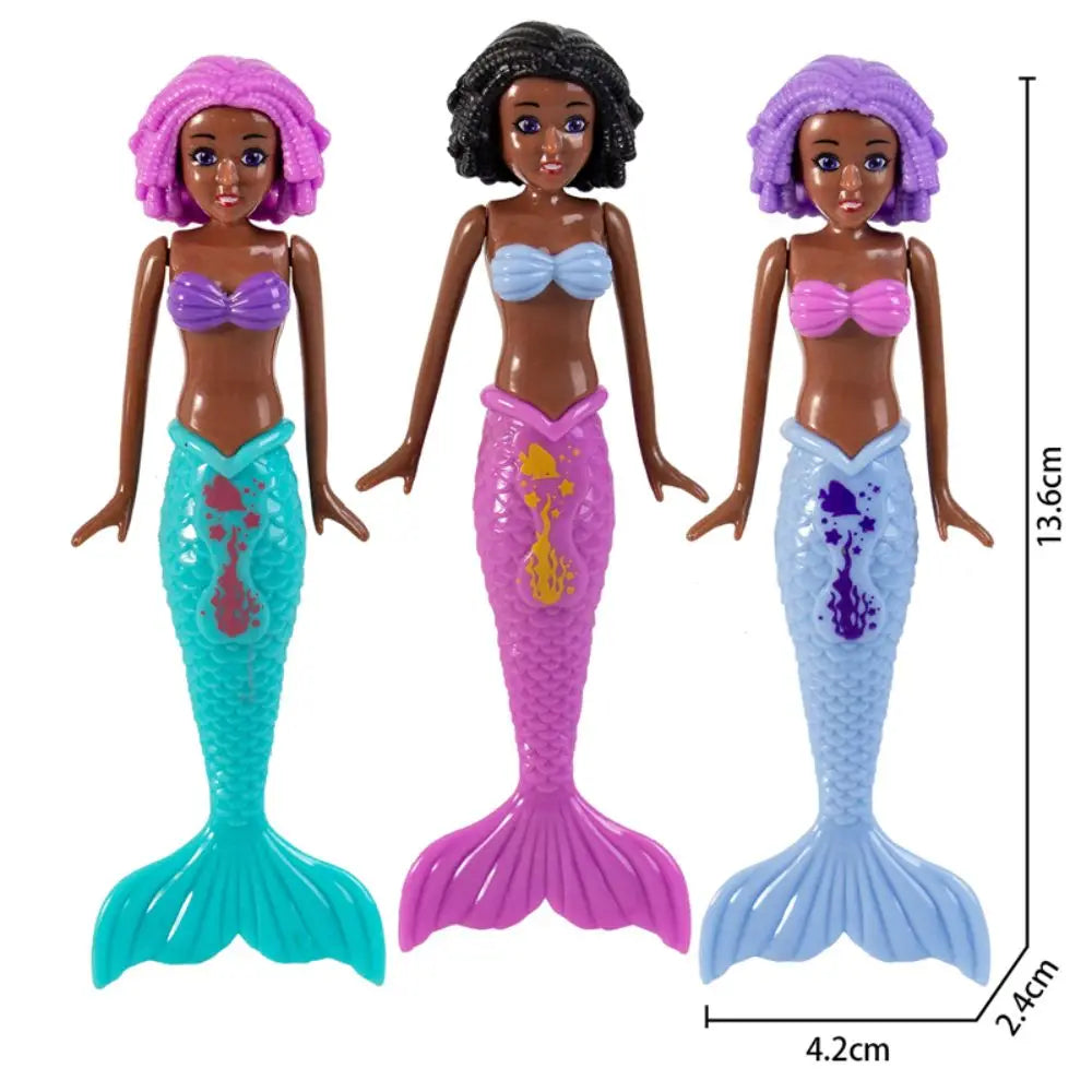 A set of four mermaid dive toys featuring different colored hair and scales for pool fun.