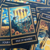 A deck of Van Gogh-inspired tarot cards featuring the Five of Wands card.