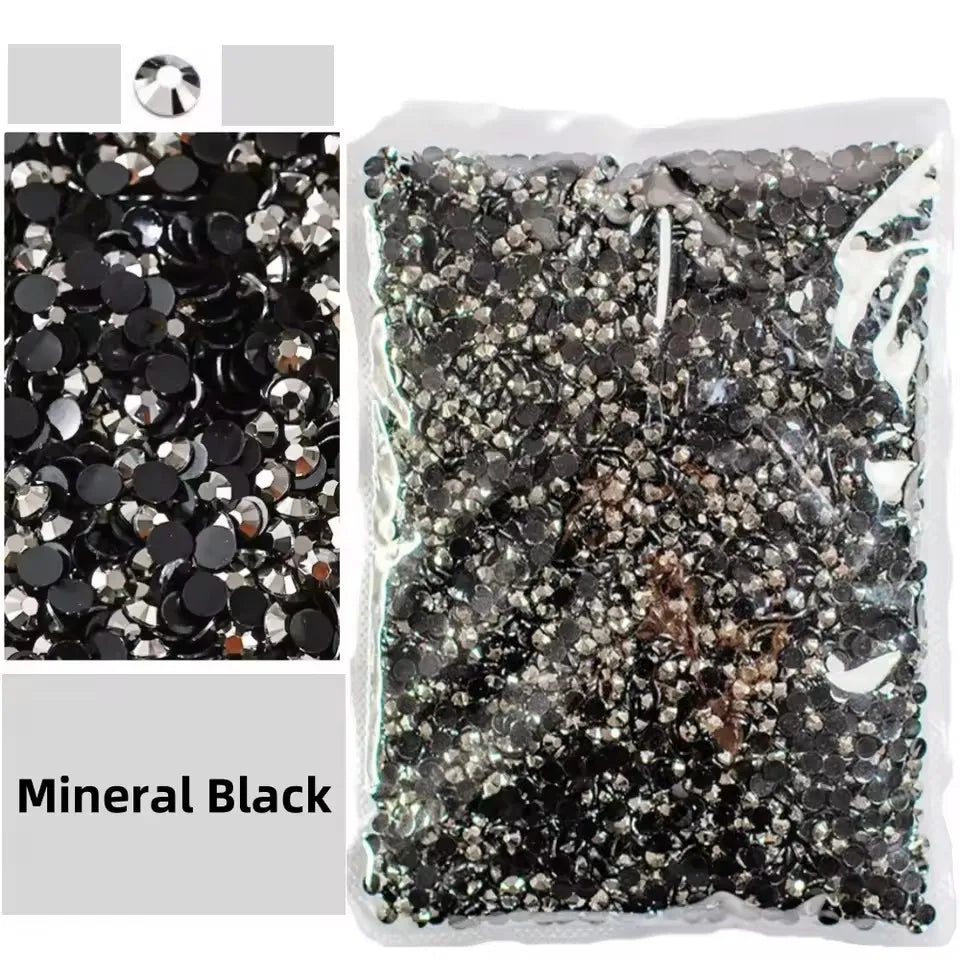 Bag of black mineral rhinestones with silver accents for crafts and DIY projects