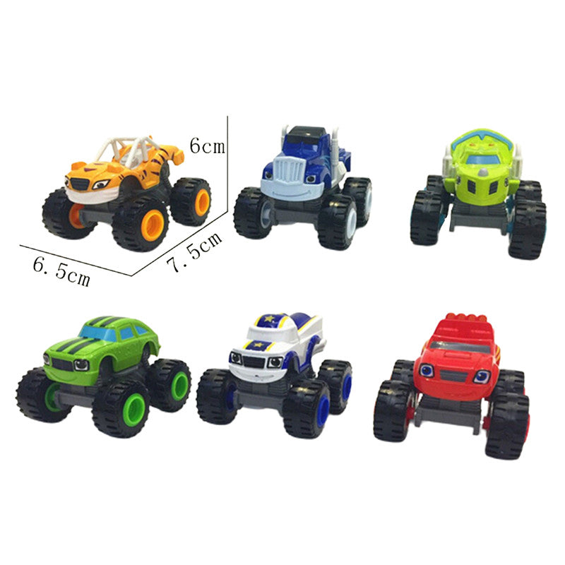 A collection of five die-cast metal monster truck toys in various colors and sizes.