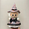 A handcrafted Halloween pumpkin costume set for a doll featuring a witch hat and black bow details.