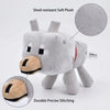 A gray plush toy resembling a wolf head with a tan muzzle, showing durable precise stitching details.