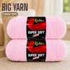 Two skeins of super soft red acrylic yarn for knitting and crochet projects