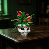 A set of gothic floral skull building blocks featuring bright green and pink flowers and leaves.