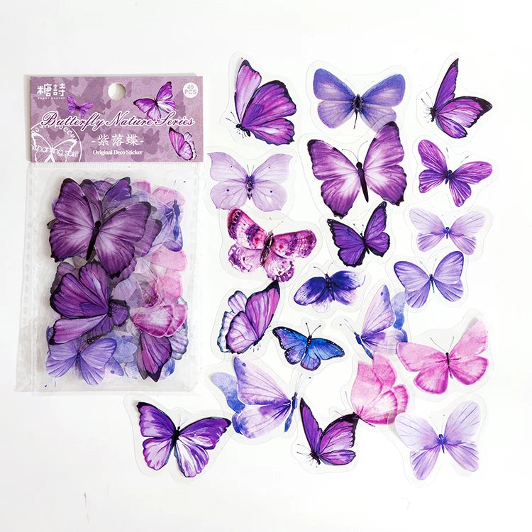 A collection of purple, pink, and blue butterfly stickers for crafting and journaling.