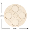 A wooden learning set with five circular cutouts arranged in a cross pattern for teaching the animal and plant life cycle.