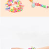 A collection of colorful bead jewelry kits and finished bracelets, including bracelets, rings, and beaded strands.