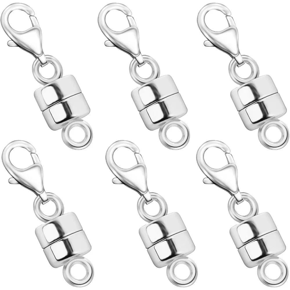 A set of silver magnetic jewelry clasps for necklaces and bracelets.