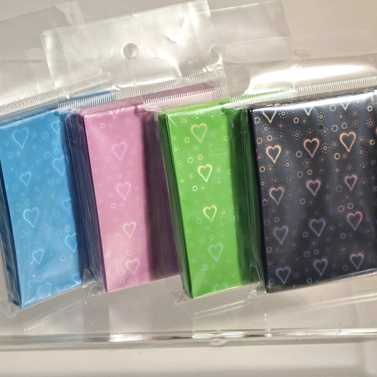 Holographic Heart-Shaped Card Sleeves (60-Pack) – Acid-Free Protectors for TCG & Collectible Cards