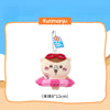 A cute pink plush keychain charm of a character wearing red goggles and a swimming ring.
