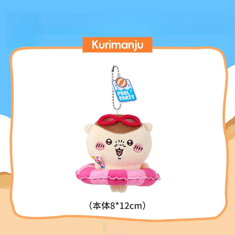 A cute pink plush keychain charm of a character wearing red goggles and a swimming ring.
