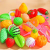 A colorful set of DIY fruit cutting music toys including plastic fruits and vegetables for children.