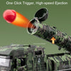 A camouflage military missile truck toy is shown launching a red projectile with a high-speed ejection mechanism.