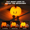 Rechargeable pumpkin LED night light demonstrating brightness levels for co-sleeping, bedside lamp, and reading.