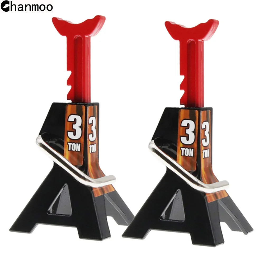 A pair of red metal simulation jack stands for 1:10 RC crawlers, featuring black and gold accents.