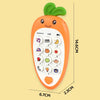 An orange baby phone toy shaped like a carrot with green leaves and various buttons for music sounds and teethering.