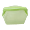 A light green reusable silicone storage bag with a slightly translucent, flexible texture.