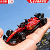 A red 1:64 scale alloy RC drift car is held in a hand against a blue sky background.