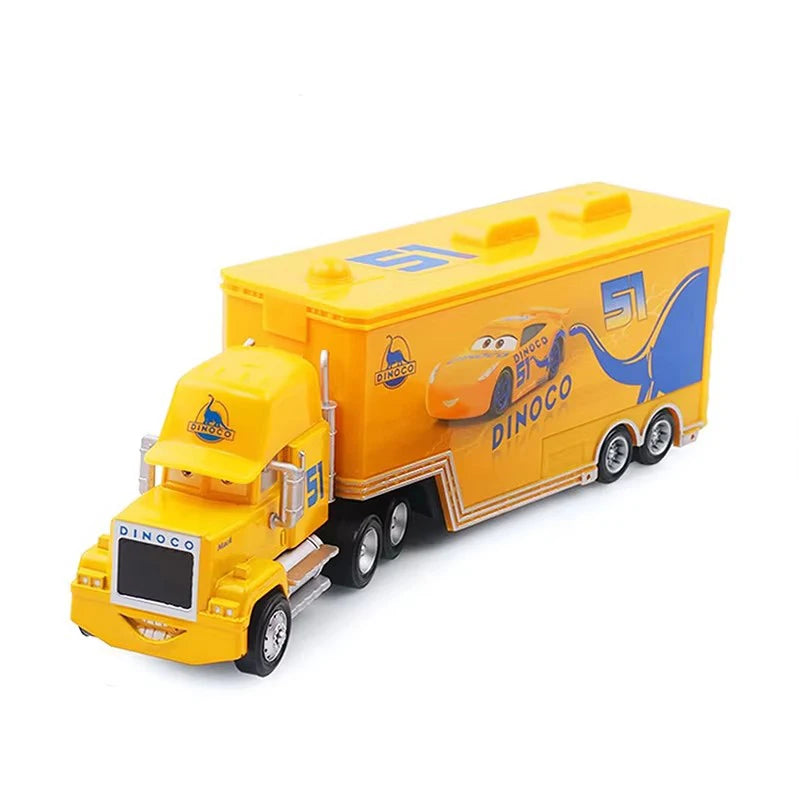 A yellow diecast toy hauler truck modeled after a Disney Pixar Cars 3 vehicle.