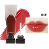 A tube of dark mirror lip glaze and a wand applicator for Maxfine 01# lipstick shade.