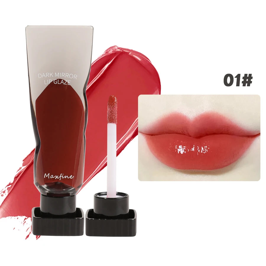A tube of dark mirror lip glaze and a wand applicator for Maxfine 01# lipstick shade.