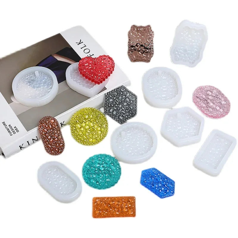 A collection of flexible silicone resin molds in various shapes and colors including heart, round, oval, and rectangle for DI