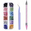 A set of multi-size flat back acrylic rhinestones in various colors arranged in compartments, next to a single gold-tipped to