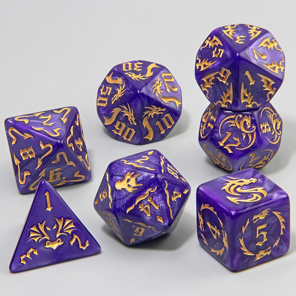 A set of purple polyhedral dice featuring a marble dragon pattern, including a tetrahedron and several other shapes.