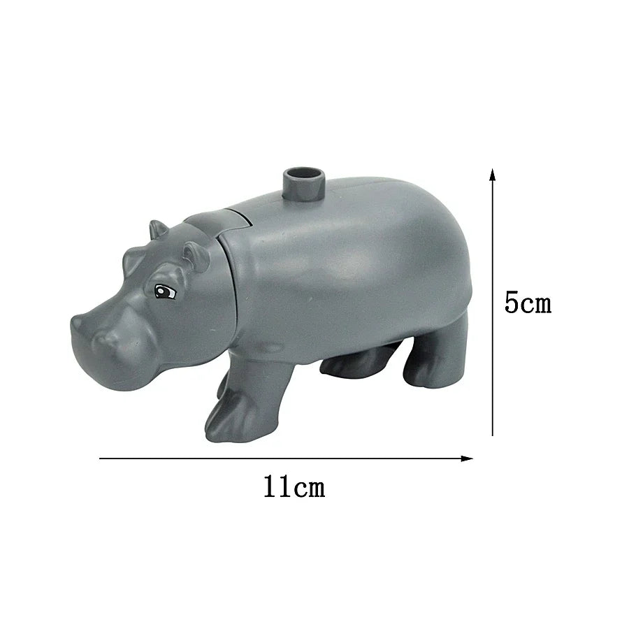 A gray plastic zoo animal building block shaped like a rhinoceros.