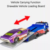 A purple diecast vehicle is shown on a loading board, demonstrating the vehicle carrying function.
