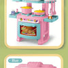 A pink and blue mini pretend play kitchen set with cooking accessories including pots, pans, and utensils.