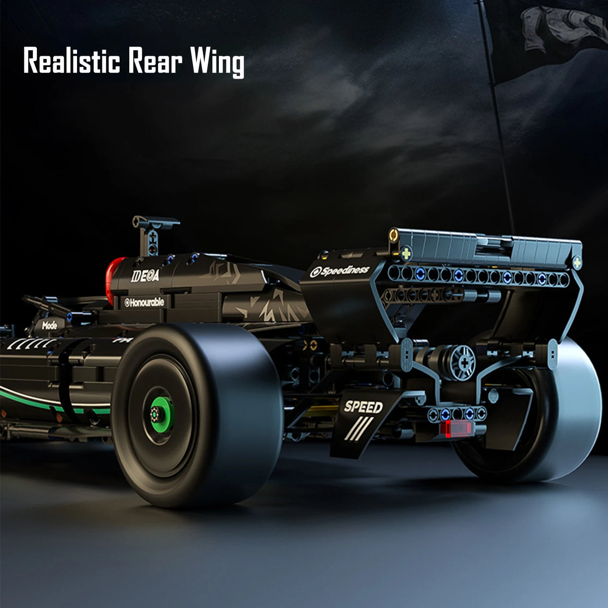 Realistic rear wing for a formula racing car model kit, shown in a dark, detailed view.