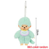 A light mint green Monchhichi plush keychain hanging from a chain.
