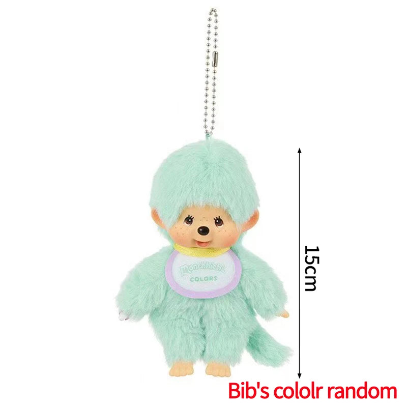 A light mint green Monchhichi plush keychain hanging from a chain.
