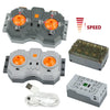A set of power functions motors and servos for building blocks, including various components and a power supply unit.